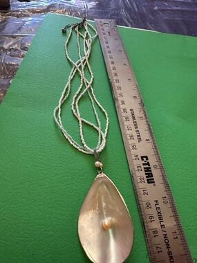 Multi-Strand White Beaded Necklace with Mother-of-Pearl Teardrop Pendant